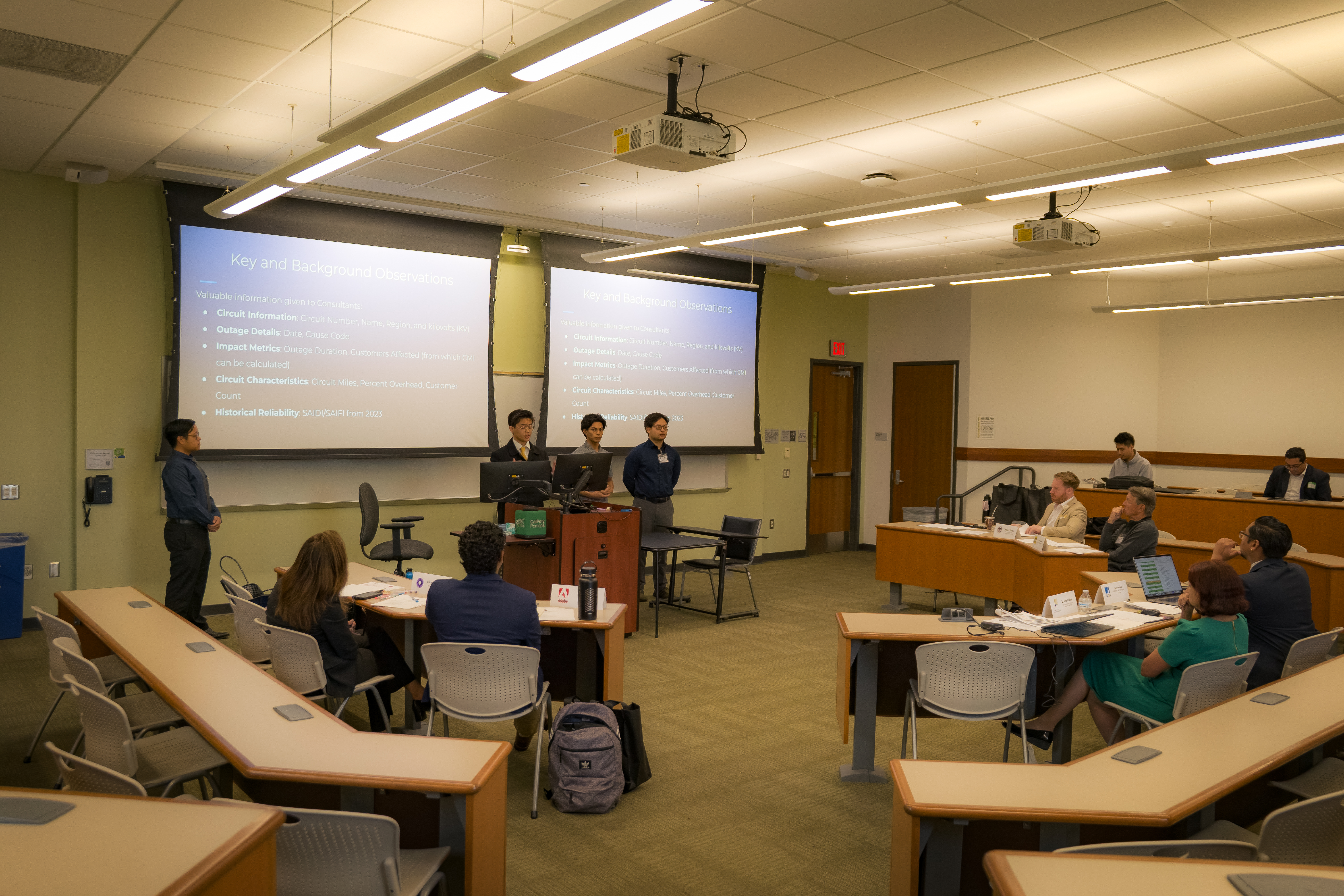 Three students presenting at ITC