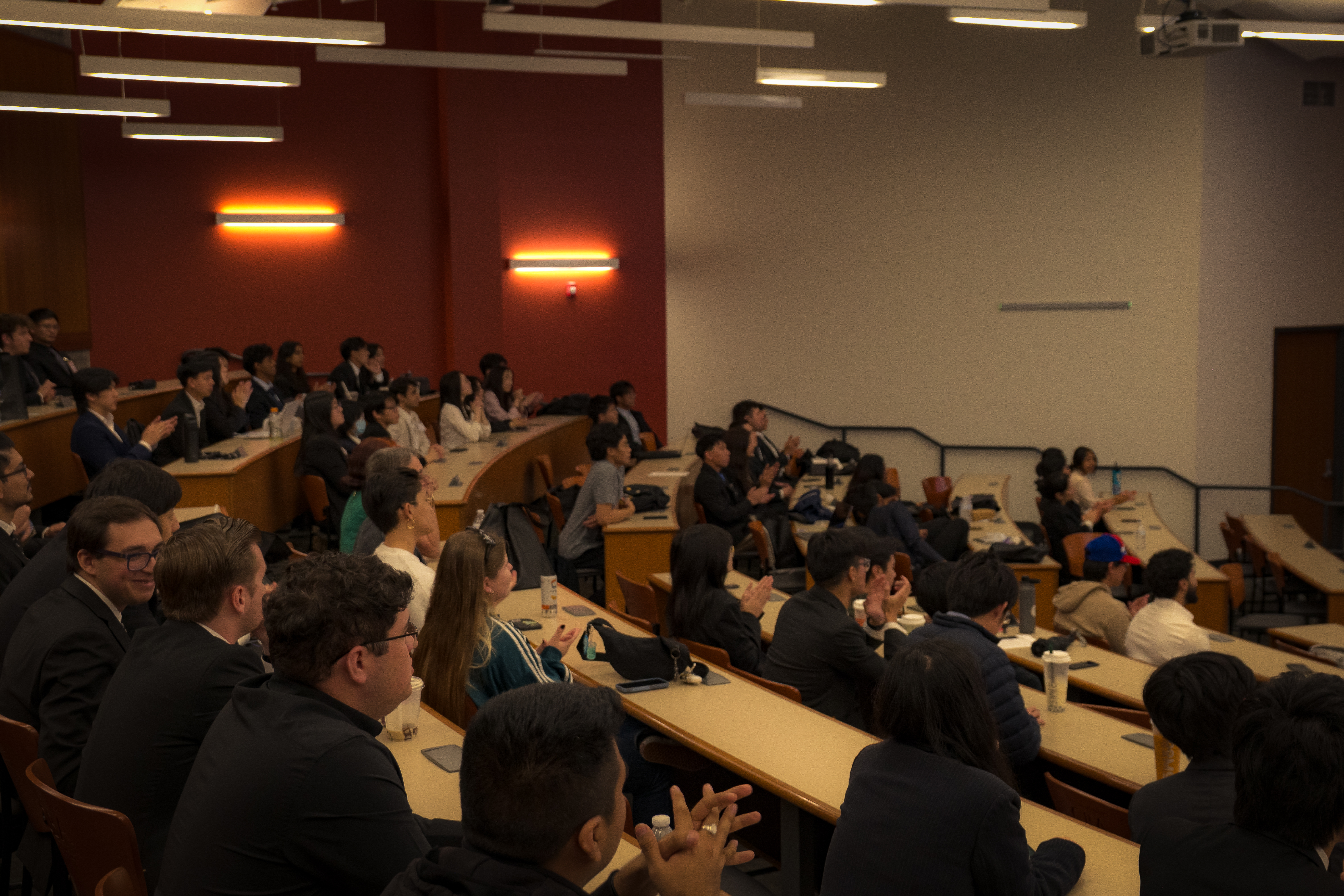 Students sitting at long desks