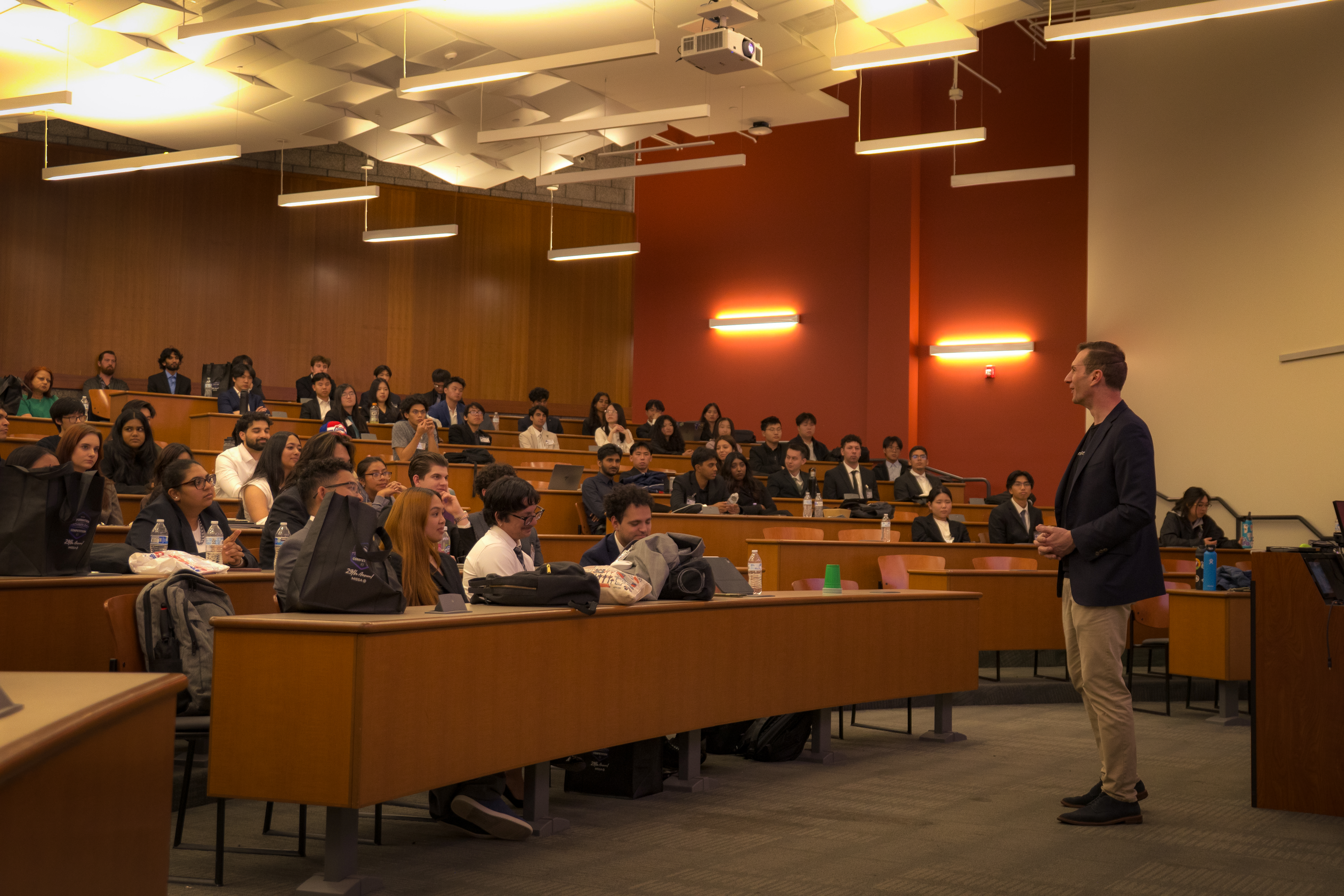 Speaker presenting to students